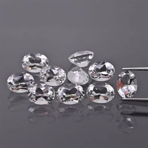 Oval stone, cone - White topaz 7x5 MM